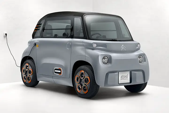 Front view of the Citroen Ami electric micro‑mobility quadricycle (L6e classification), highlighting its symmetrical design, 6 kW motor, and ultra‑compact 2410 mm length for urban driving.