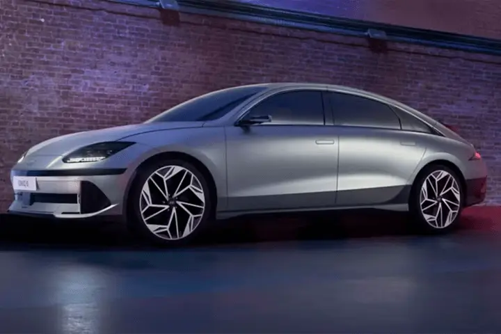 Hyundai Ioniq 6 front view showcasing the signature Parametric Pixel LED headlights and smooth aerodynamic hood for technical specs page.