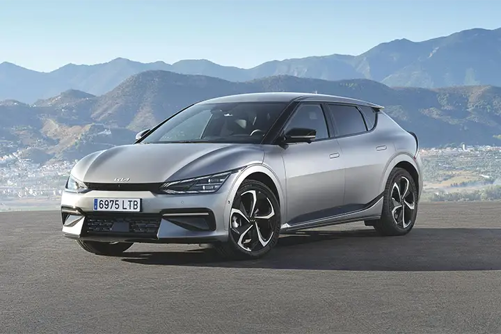 Front view of the Kia EV6 (2022–2024) electric crossover, showing LED headlights, aerodynamic bumper design, and the E-GMP platform with 800 V fast-charging capability.