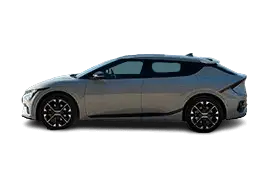 Side profile of the Kia EV6 (2025 facelift) electric crossover, highlighting its coupe-like roofline, new alloy wheel design, and long wheelbase with improved battery capacity up to 84.0 kWh.