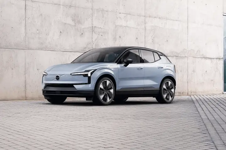 Front view of Volvo EX30 electric SUV, highlighting compact dimensions, closed grille design, and aerodynamic profile