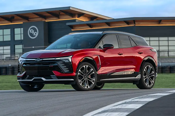 Front view of the Chevrolet Blazer EV 2025 electric SUV with LED headlights, bold grille, Ultium Platform, and DC fast charging up to 195 kW.